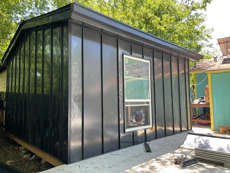 Black standing seam metal wall panels for Metal Roof Installation in Bountiful